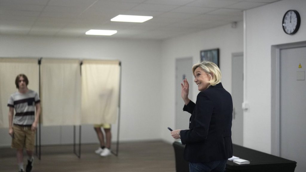 French far right leader Marine Le Pen arrives to vote, Sunday, June 30, 2024 in Henin-Beaumont, northern France.