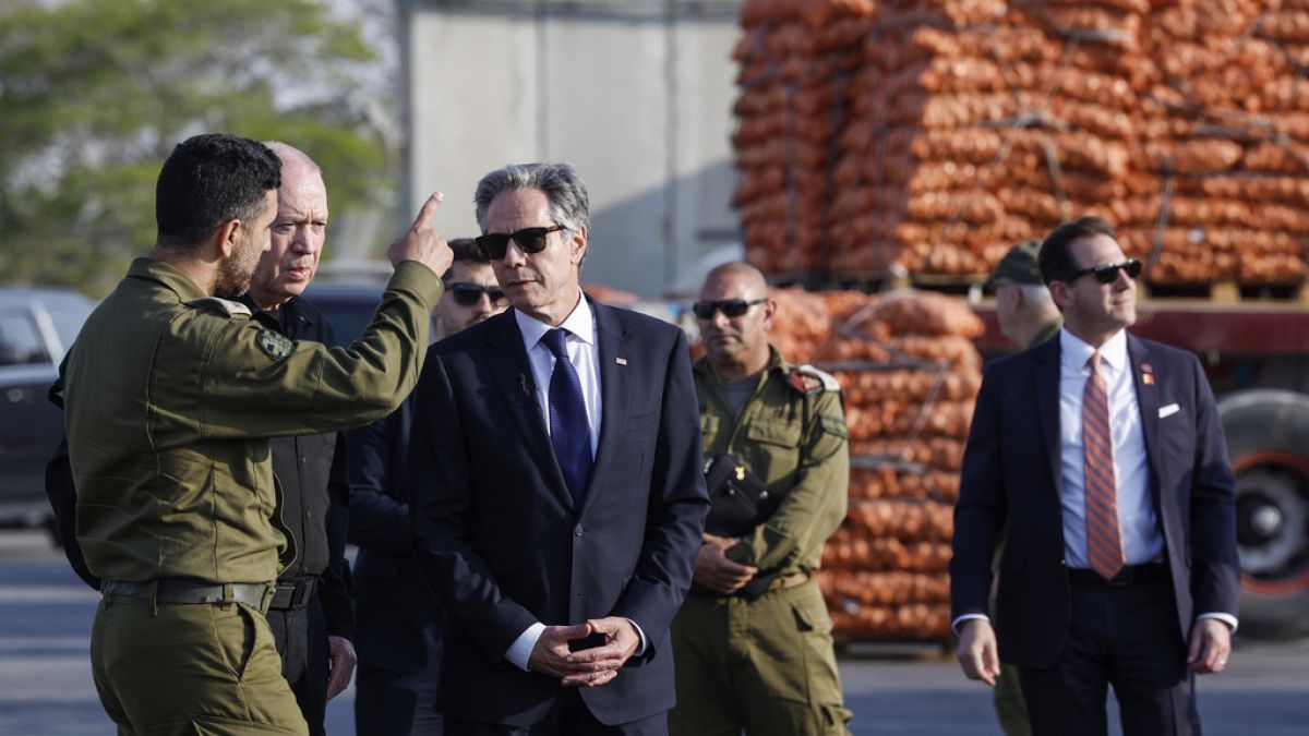 U.S. Secretary of State Antony Blinken walks with Israeli Defense Minister Yoav Gallant, at the Kerem Shalom border crossing, Israel, May 1, 2024.