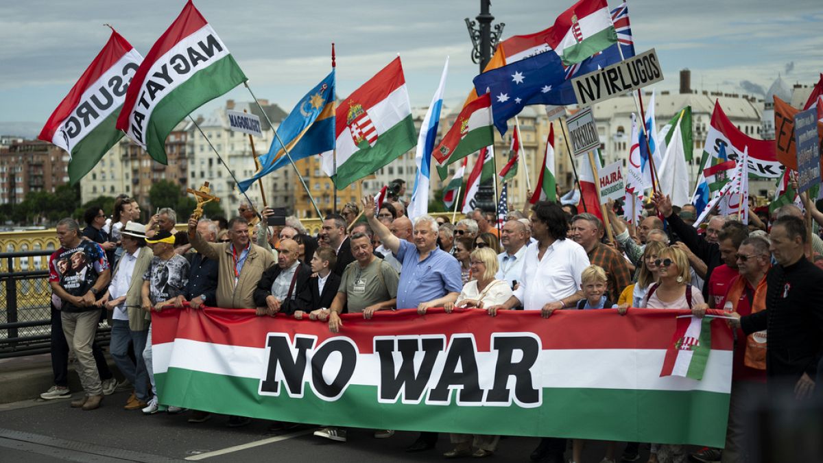 People march during a rally in support of Hungary