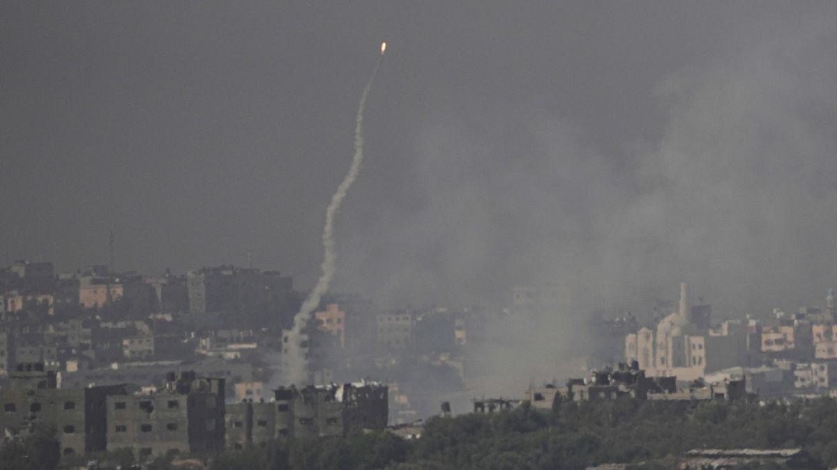 FILE - A rocket launched at Israel from the Gaza Strip is seen misfiring before landing inside Gaza, as seen from southern Israel, Oct. 23, 2023.