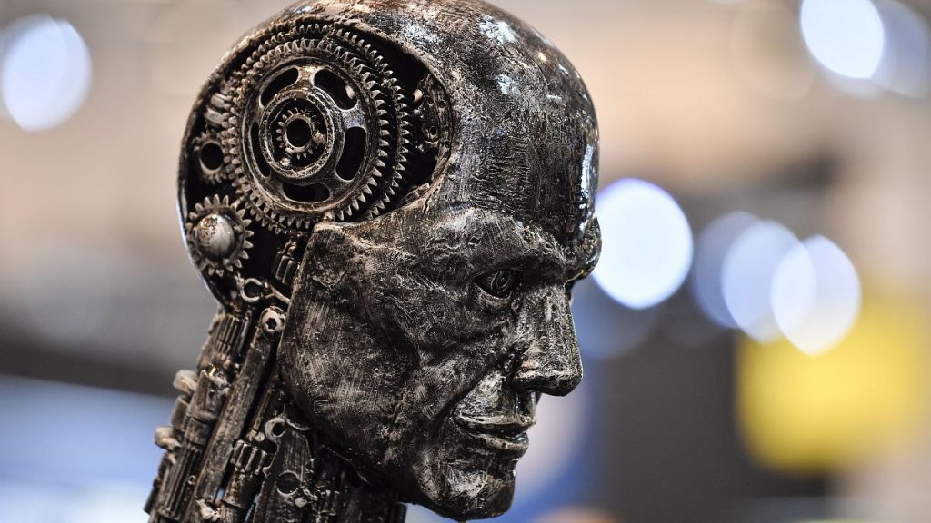 A metal head made of motor parts symbolizes artificial intelligence AI at the Essen Motor Show fair for tuning and motorsports in Essen, Germany, Friday, Nov. 29, 2019.