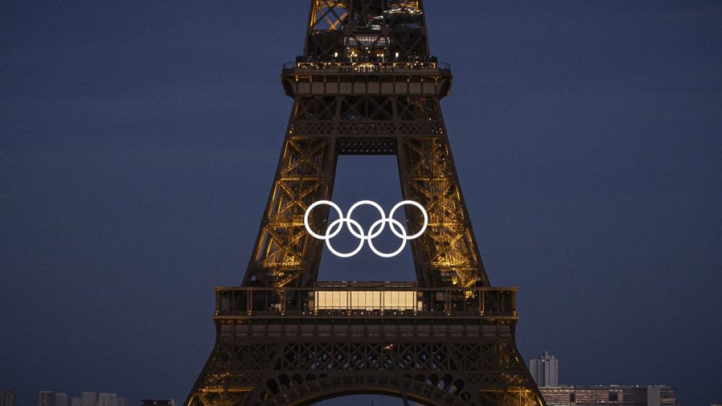 Olympic rings are seen on the Eiffel Tower Friday, June 7, 2024, in Paris. (AP Photo/Aurelien Morissard)