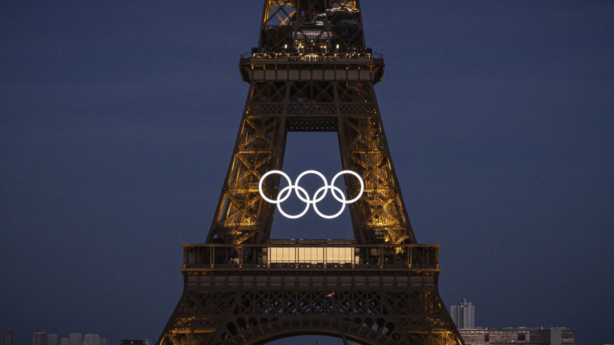 Olympic rings are seen on the Eiffel Tower Friday, June 7, 2024, in Paris. (AP Photo/Aurelien Morissard)