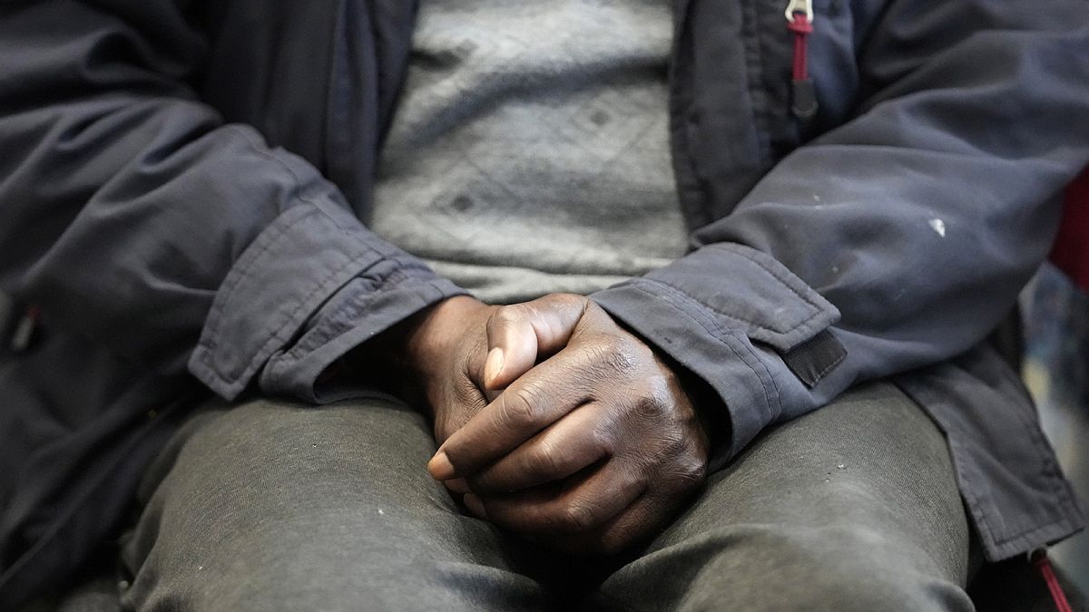 A local resident waits at the Community Food Hub in London, 4 May 2022