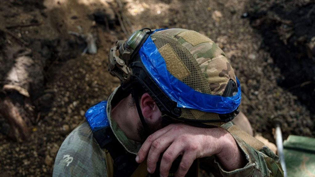 A Ukrainian national guard serviceman prepares to reload his D-20 cannon  near Kharkiv, Ukraine,June 10, 2024