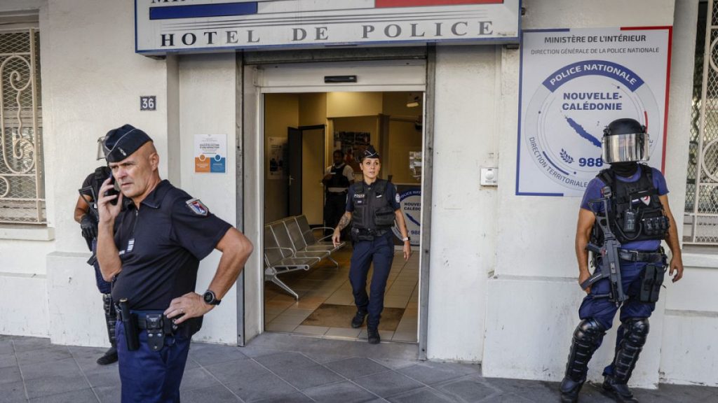 Police in the restive French Pacific territory of New Caledonia rounded up 11 people on Wednesday, including an independence leader, who are suspected of having a role in the