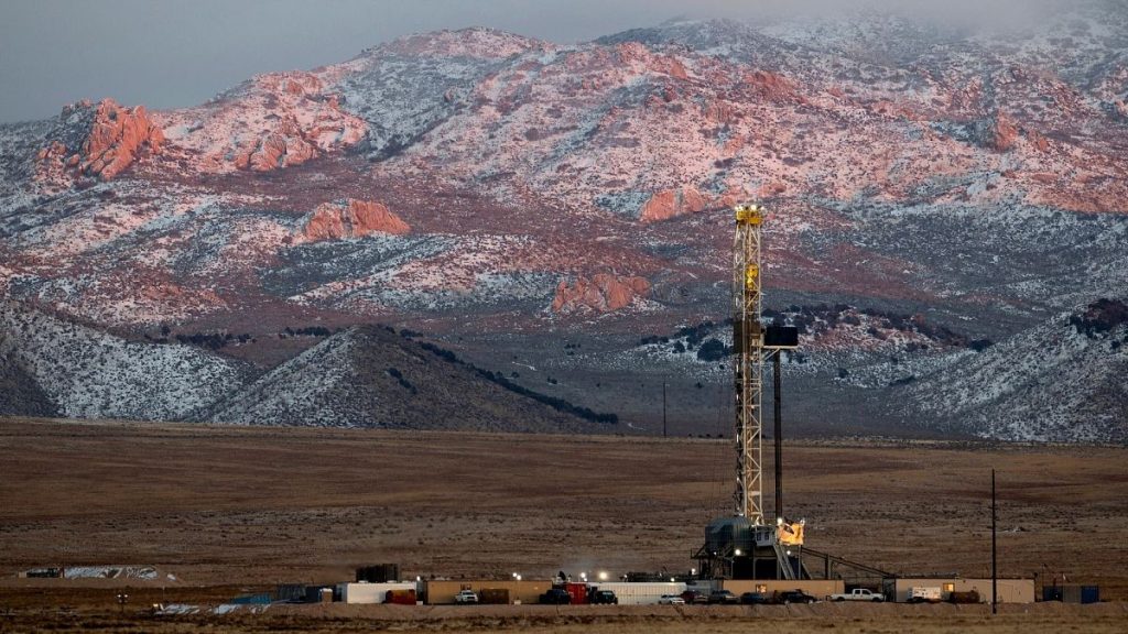 A drill rig stands at a Fervo Energy geothermal site under construction near Milford, Utah, 26 November 2023.