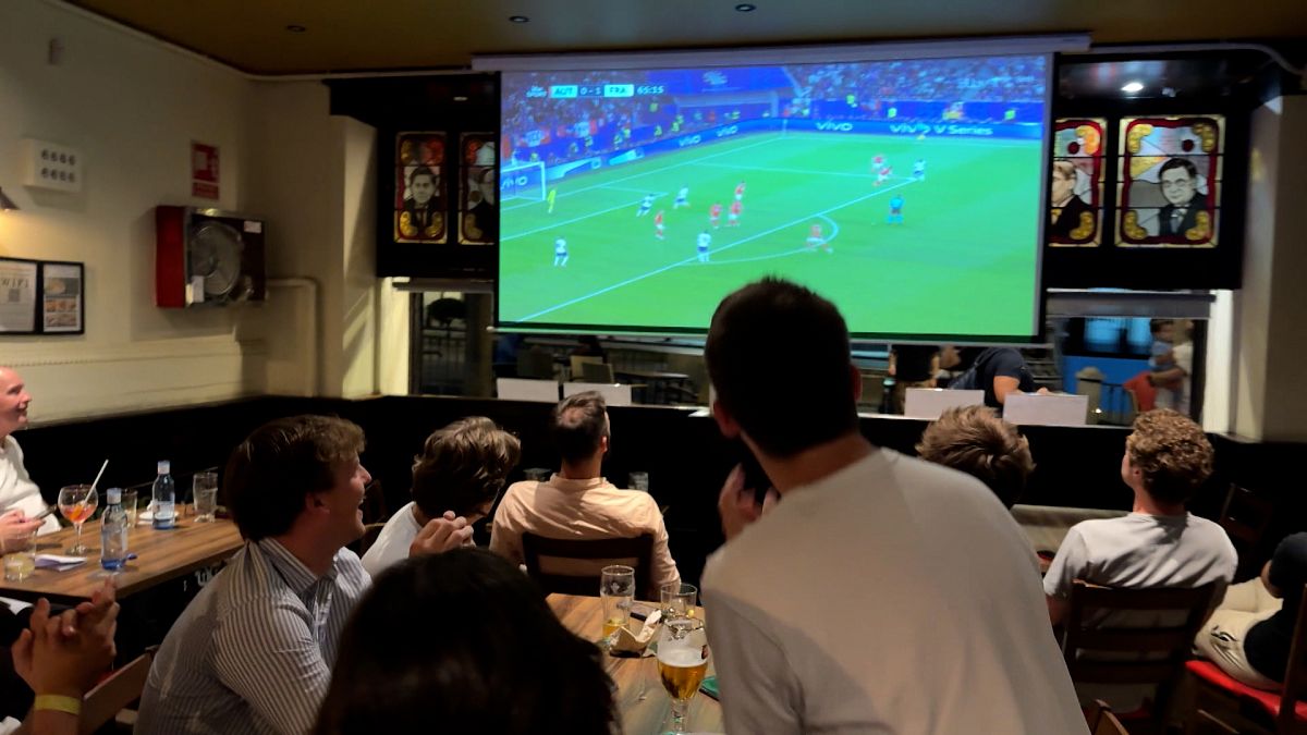 French citizens living in Madrid enjoying the national game for EuroCup 2024