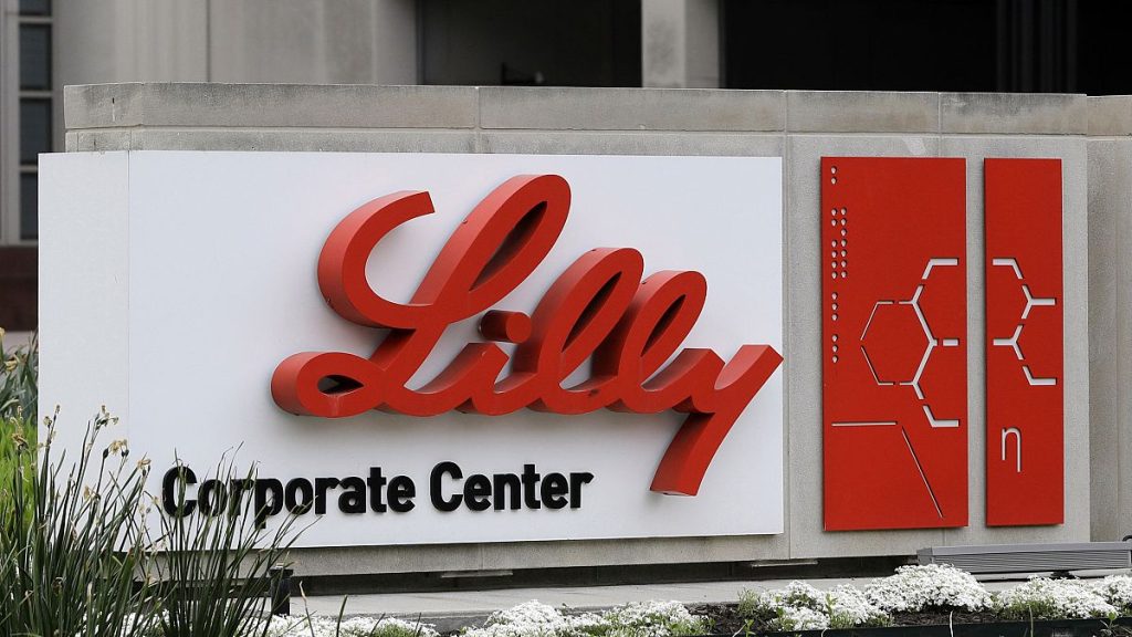 A sign for Eli Lilly & Co. sits outside their corporate headquarters.