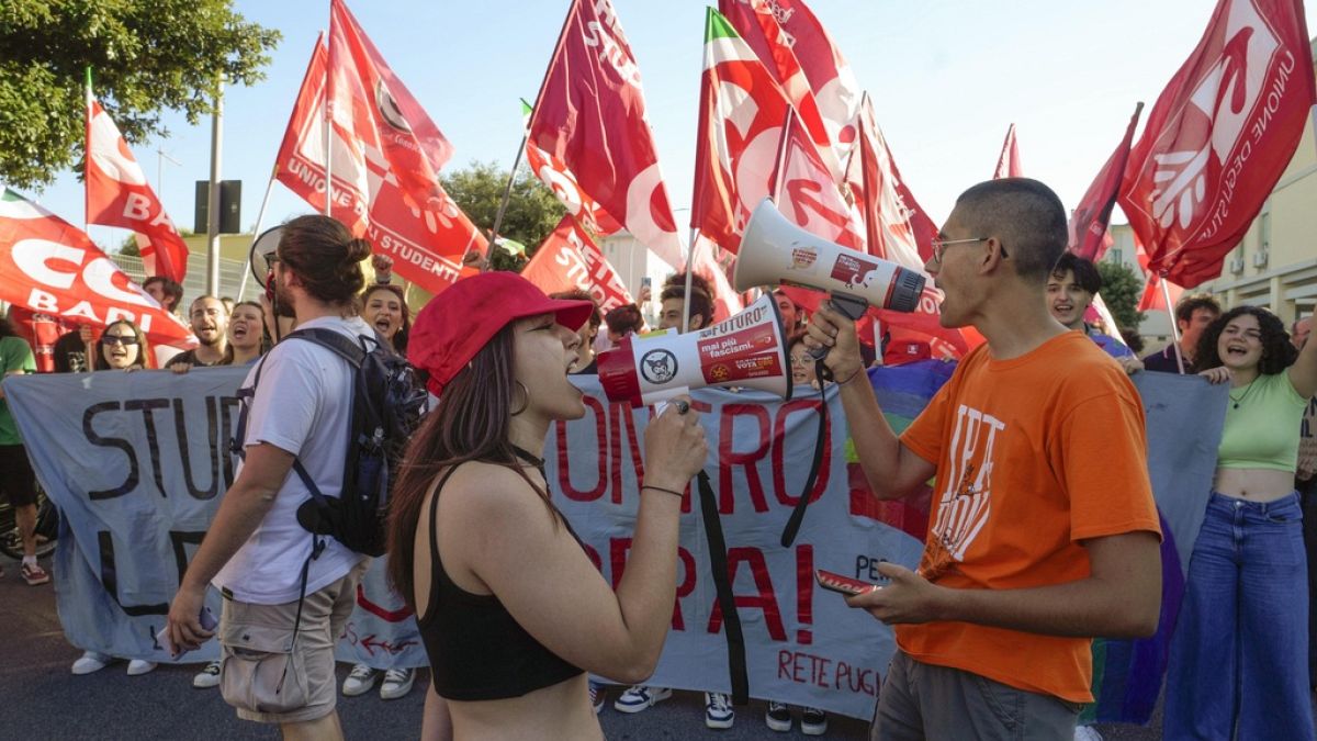 Demonstrators shout slogans during a protest against the G7 summit in Fasano, southern Italy, Friday, June 14, 2024.