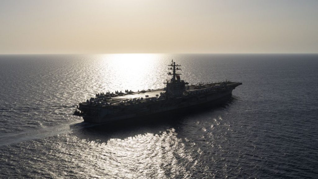 The USS aircraft carrier Dwight D. Eisenhower sails in the Red Sea on Wednesday, June 12, 2024.