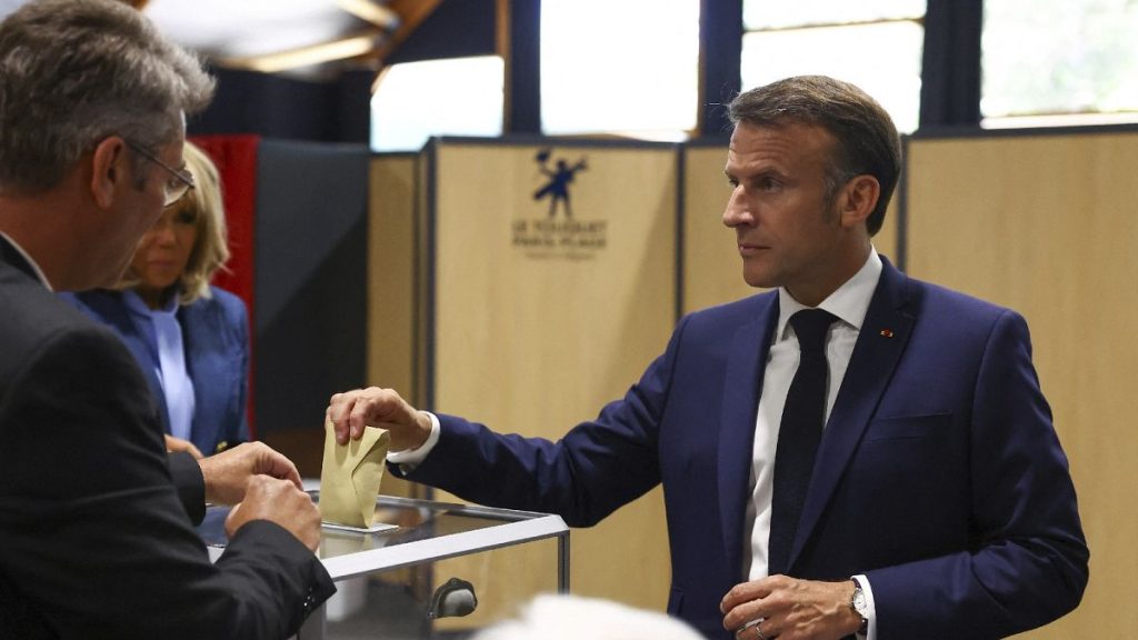 French President Emmanuel Macron votes during the European election, in Le Touquet-Paris-Plage, northern France, June 9, 2024.