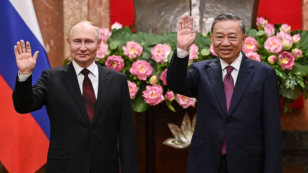 Russian President Vladimir Putin, left, and Vietnam