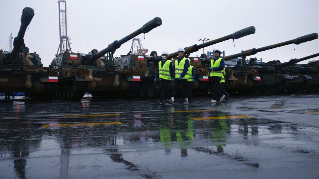 K9 howitzers in the Polish Navy port of Gdynia, Poland, Tuesday, Dec. 6, 2022.(AP Photo/Czarek Sokolowski)