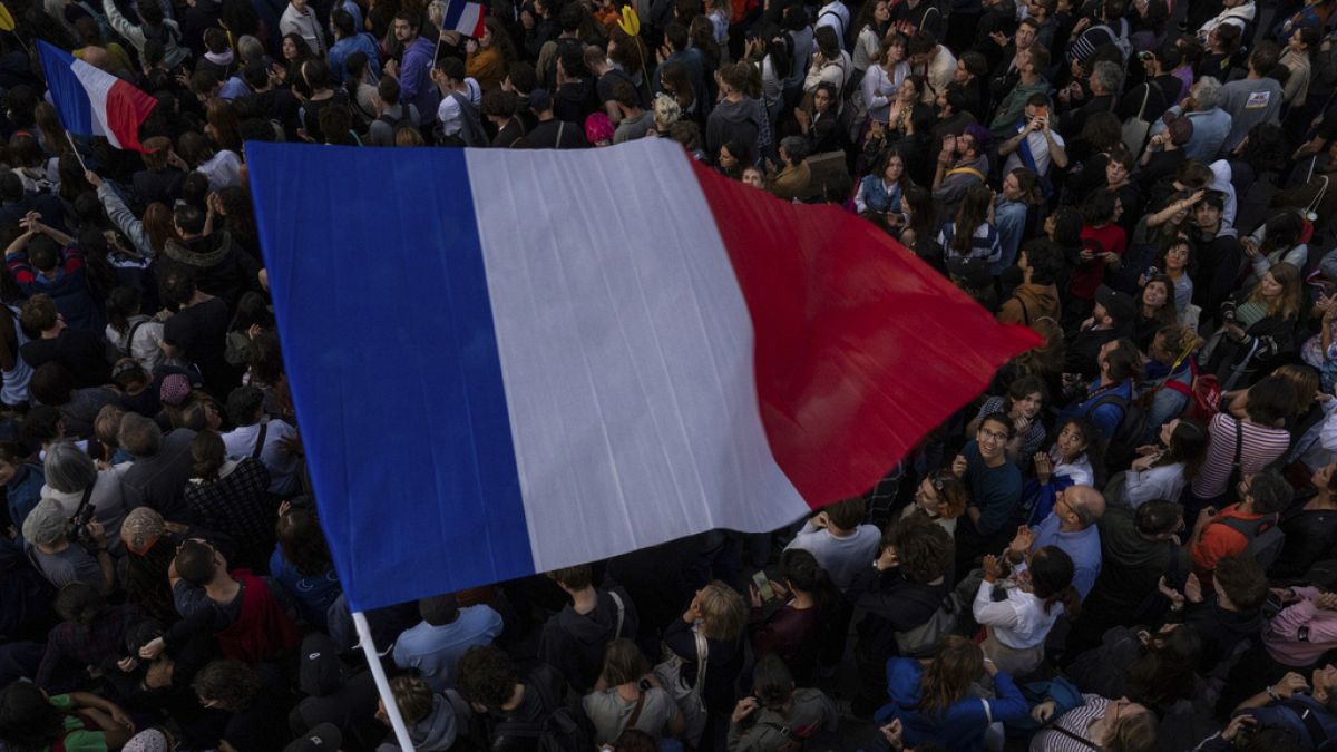 People gather at Republique plaza in a protest against the far-right, Wednesday, July 3, 2024, in Paris.