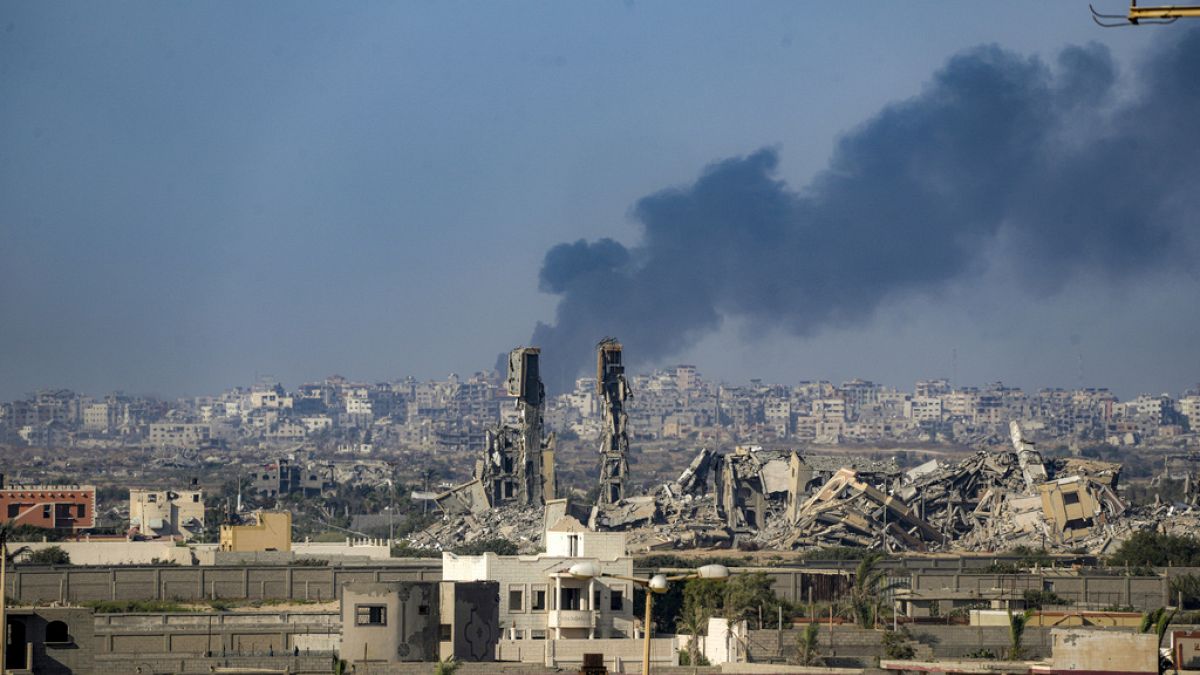 Smoke rises following an Israeli airstrike in the central Gaza Strip.