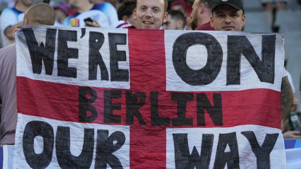 An England fan cheers on his team prior ahead of their success in the semi-finals of Euro 2024