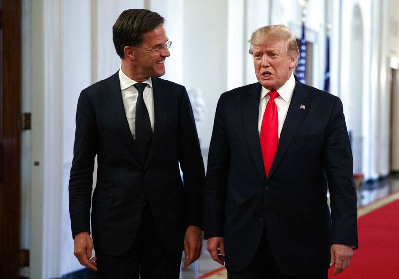 President Donald Trump arrives with Dutch Prime Minister Mark Rutte