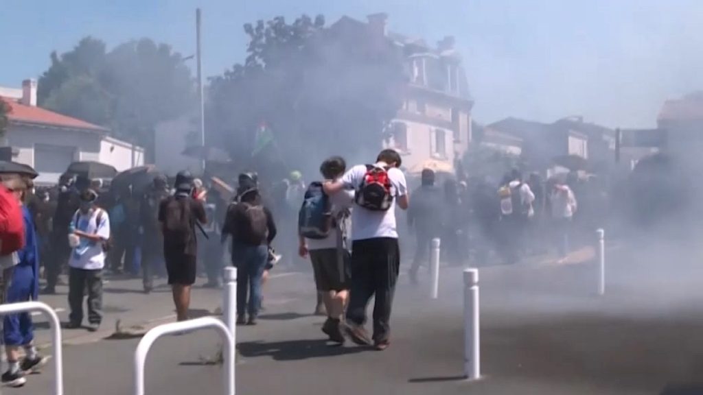 French police used tear gas and water cannons to disperse protesters.