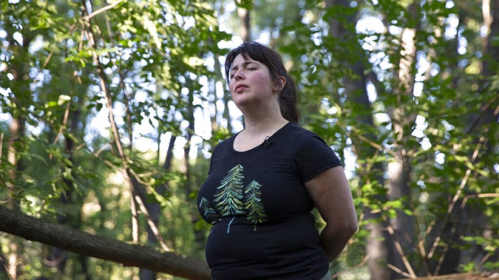 Leigha Horton of Silvae Spiritus closes her eyes as she invites participants to ground themselves and focus on their sense of hearing Monday, Sept. 23, 2019