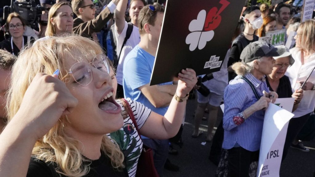 People protest before Poland