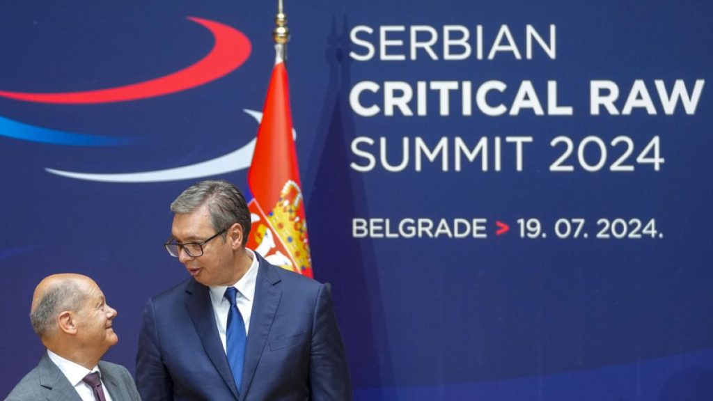 German Chancellor Olaf Scholz, left, and Serbian President Aleksandar Vucic leave after a press conference at the Serbia Palace in Belgrade, Serbia, Friday, July 19, 2024.