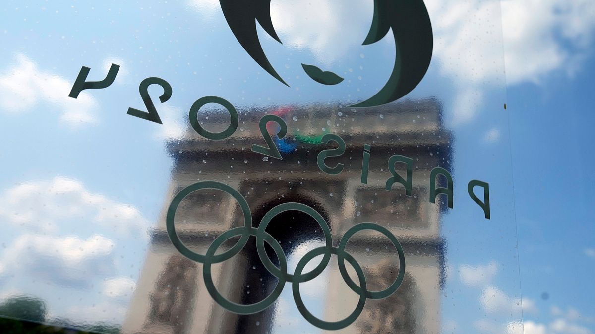 A view of the Arc de Triomphe though the window of a bus ahead of the 2024 Summer Olympics, Wednesday, July 24, 2024, in Paris, France.