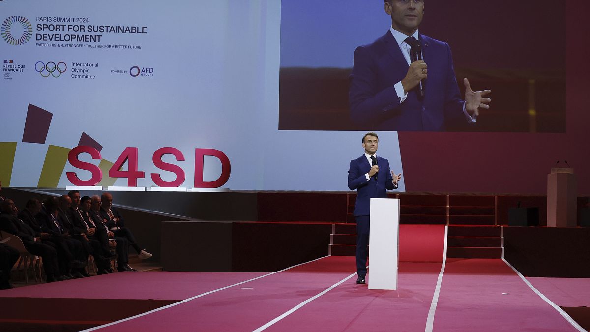 French President Emmanuel Macron addresses the audience during the Sport for Sustainable Development Summit at the Paris Olympic, July 25, 2024