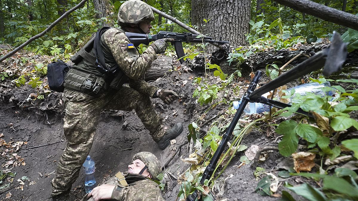 Ukrainian soldiers take part in tactical and medical training exercises in Kharkiv.