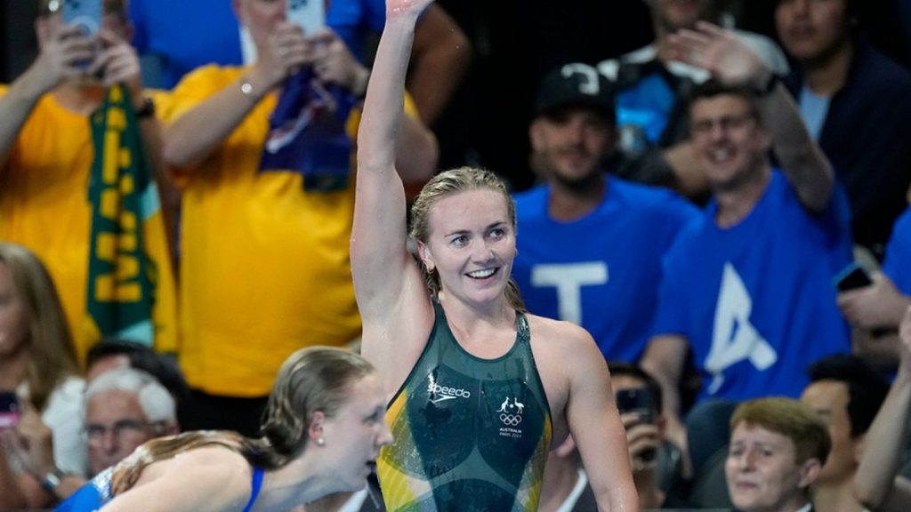 Ariarne Titmus, of Australia, celebrates after winning the women