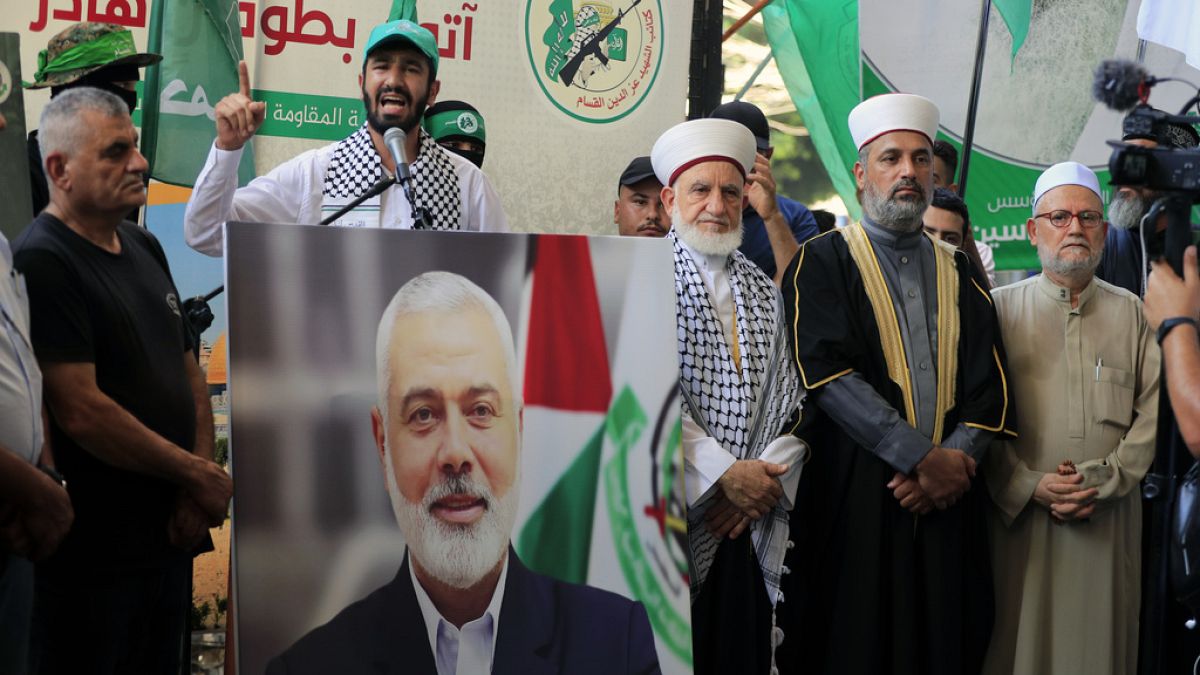 Hamas members attend a protest to condemn the killing of Hamas political chief Ismail Haniyeh at al-Bass Palestinian refugee camp in Lebanon Wednesday, July 31, 2024.