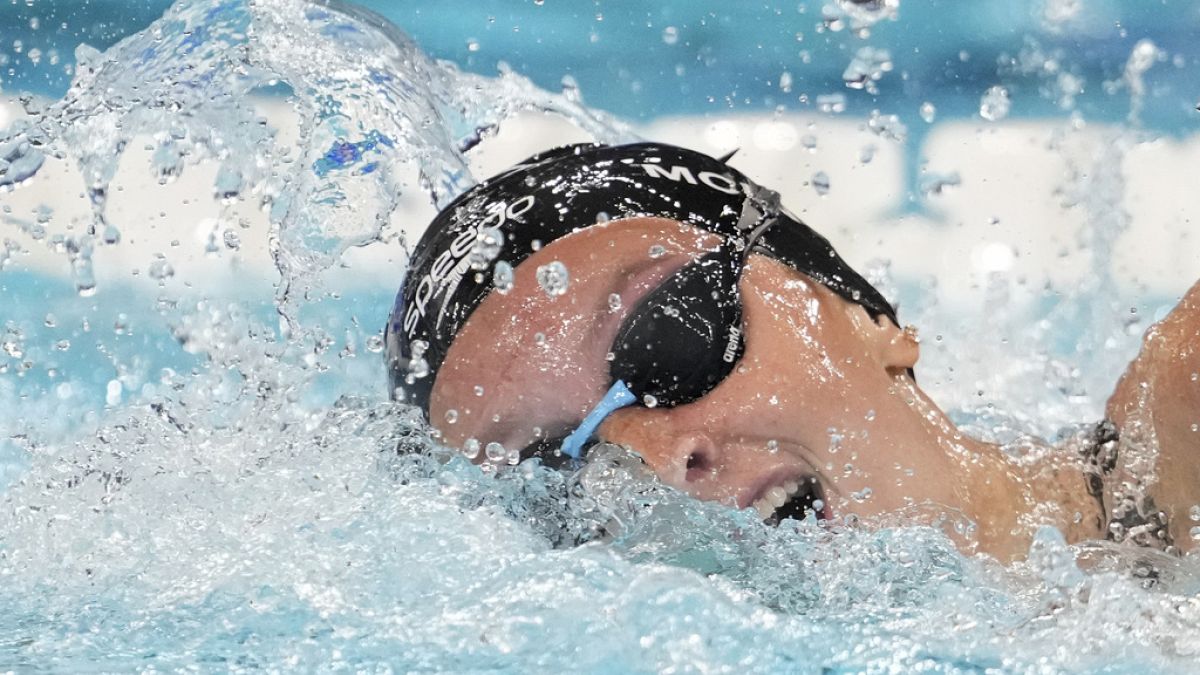 Summer McIntosh, of Canada, competes during a heat in the women