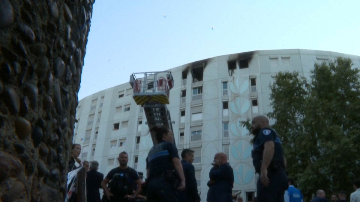 Emergency services in front of building