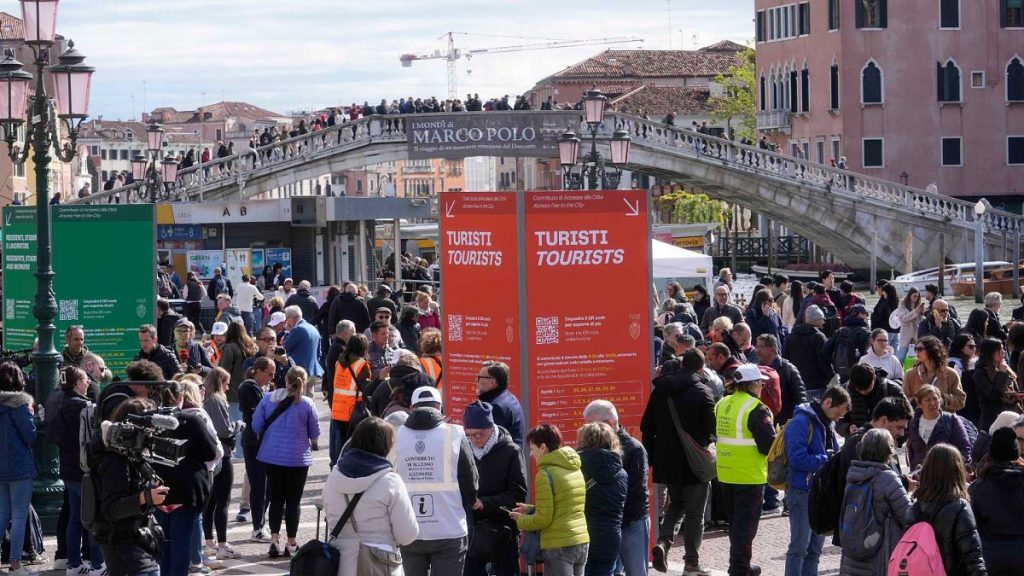 Stewards check tourists