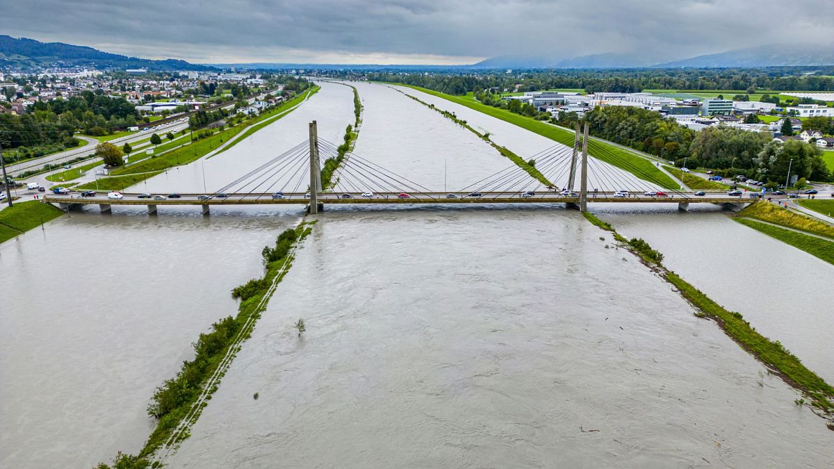 The river Rhine floods the areas between the protection dams at the Rhine bridge in Diepoldsau near Lake Constance, Switzerland in 2023.