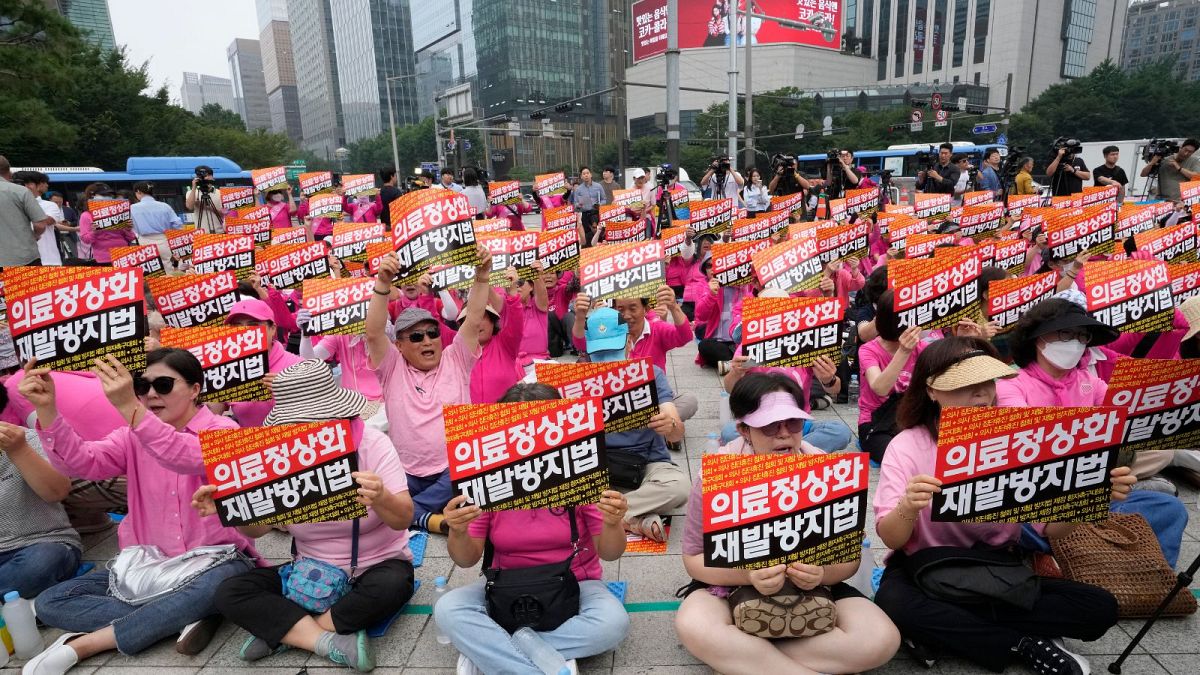 Patients and their family members stage a rally demanding doctors to end the ongoing walkout.