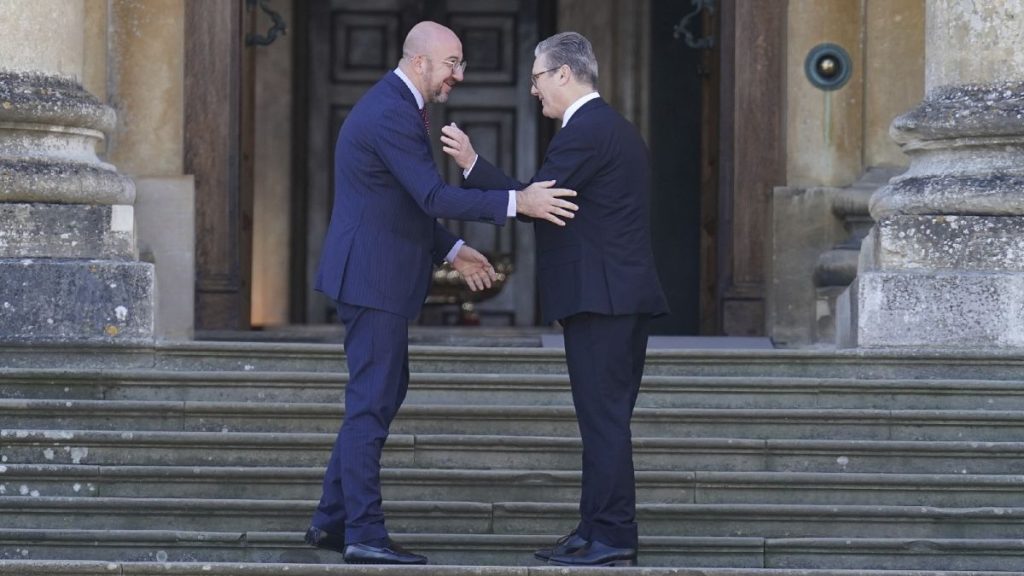 European Council President Charles Michel, left, is welcomed by Prime Minister Sir Keir Starmer to the European Political Community summit at Blenheim Palace, July 18, 2024.