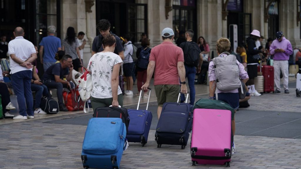 Travelers arrive at Gare de Bordeaux Saint-Jean at the 2024 Summer Olympics in Bordeaux, France, on Friday, July 26, 2024. Hours before the grand opening Olympics ceremony