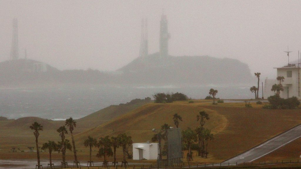 File- The H-2A rocket sits on the launch pad in the rain at Tanegashima Space Center in Tanegashima, southern Japan, Thursday, Jan. 19, 2006.