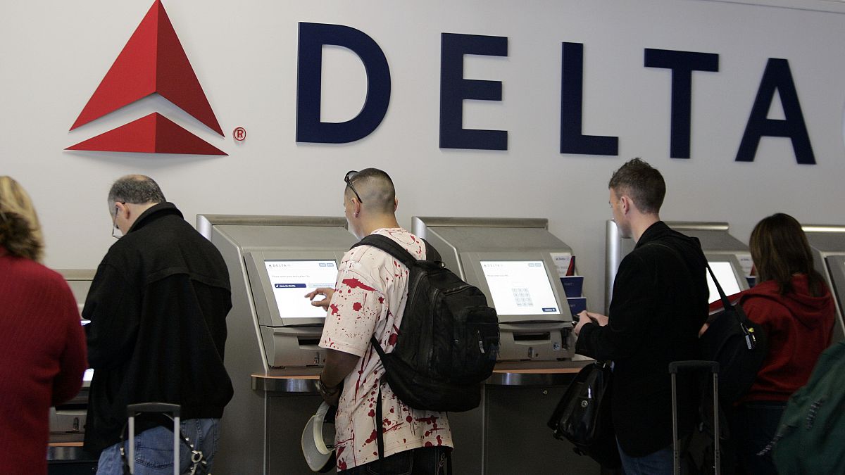 Passengers use Delta Air Lines