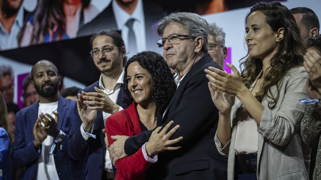 French far-left party La France Insoumise (Unbowed) leader, Jean-Luc Melenchon, greets far-left candidate for the European elections Manon Aubry, during a political rally