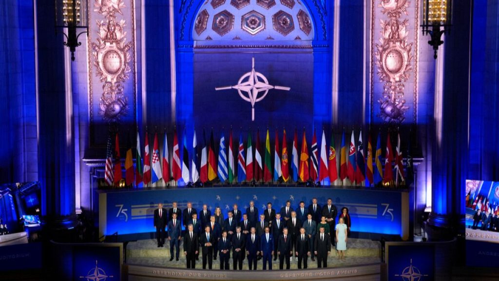 President Joe Biden, front row center, poses during a family photo with allied heads of state and government, Tuesday, July 9, 2024, in Washington.