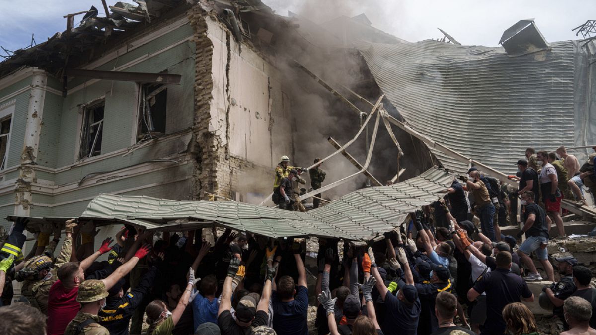 Emergency services work at the site of Okhmatdyt children’s hospital hit by Russian missiles, in Kyiv, Ukraine, Monday, July 8, 2024 (AP Photo/Evgeniy Maloletka)