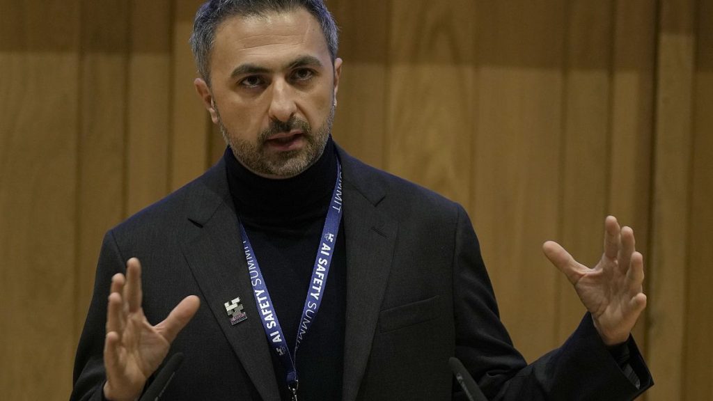 FILE - Mustafa Suleyman co founder and CEO of Inflection AI speaks to journalist during the AI Safety Summit in Bletchley Park, Milton Keynes, England, on Nov. 1, 2023.