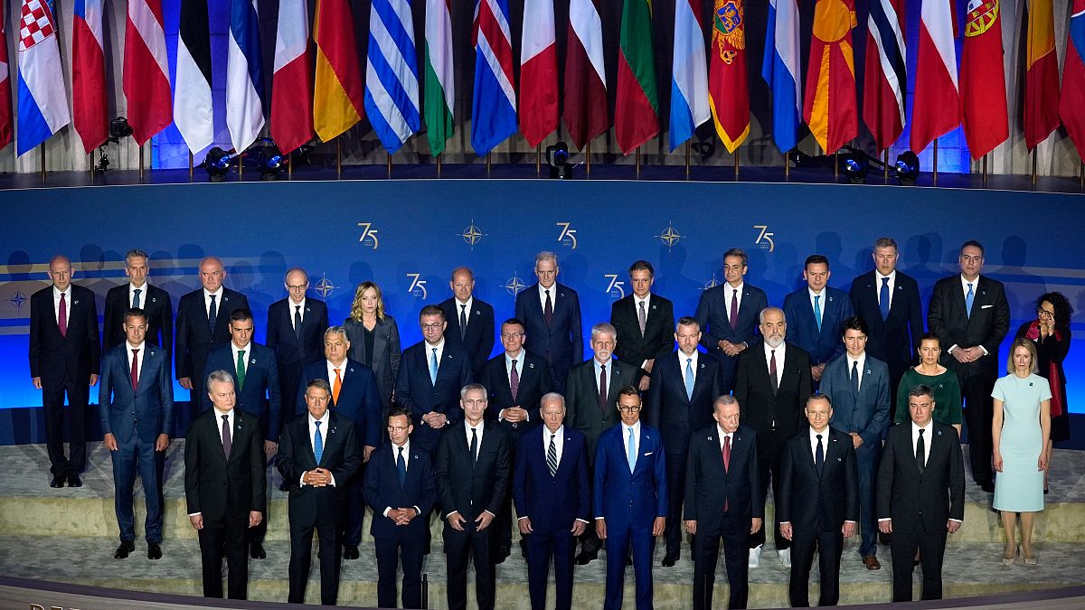 NATO leaders pose for a family photo at the Andrew W. Mellon Auditorium, Tuesday, July 9, 2024, in Washington.