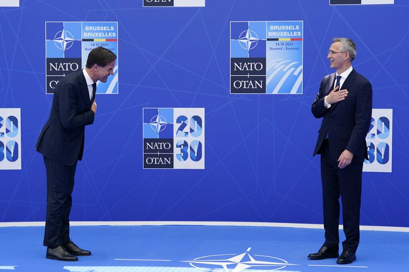  Mark Rutte speaks with outgoing NATO Secretary General Jens Stoltenberg 