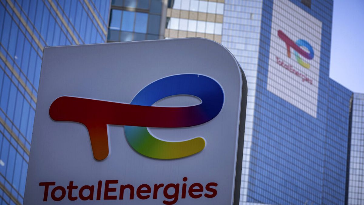 The logo of TotalEnergies is seen at an electric vehicle fuelling station in La Defense business district in Courbevoie near Paris, France, Wednesday, March 1, 2023. (AP Photo