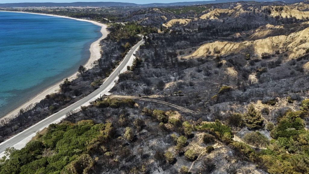 An aerial shot shows part of the extinguished wildfire area at the Anzac Cove beach, the site of World War I landing of the ANZACs (Australian and New Zealand Army Corps).