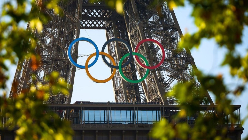 The Olympic rings are seen on the Eiffel Tower Friday, 7 June 2024 in Paris.