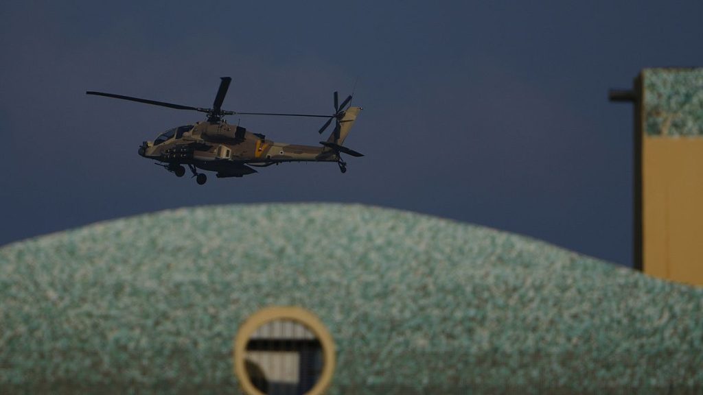 Israeli Apache helicopters fly toward northern Israel, Sunday, Aug. 25, 2024.